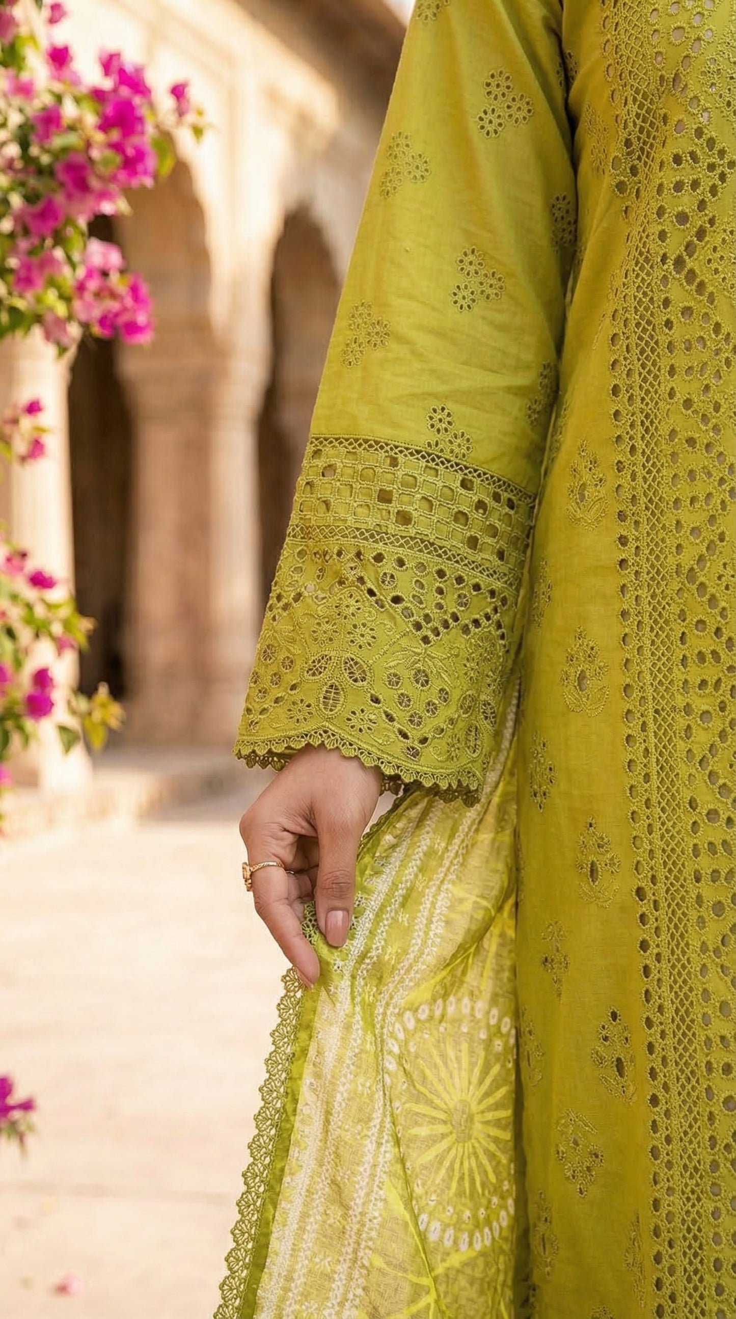 Yellow embroidered garment with floral background